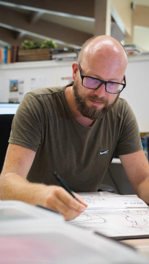 A man looking at a paper